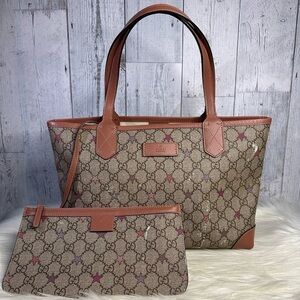 GUCCI monogram star canvass shoulder bag in brown